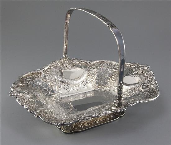 A Victorian pierced and embossed silver shaped rectangular fruit basket by Atkin Brothers, 37 oz.